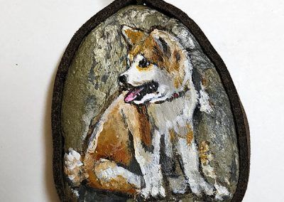 Piedra pintada cachorro perro