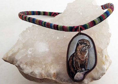 Piedra pintada nutria