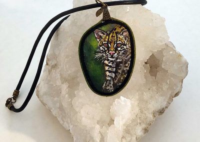Piedra pintada ocelote