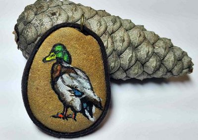 Piedra pintada pato